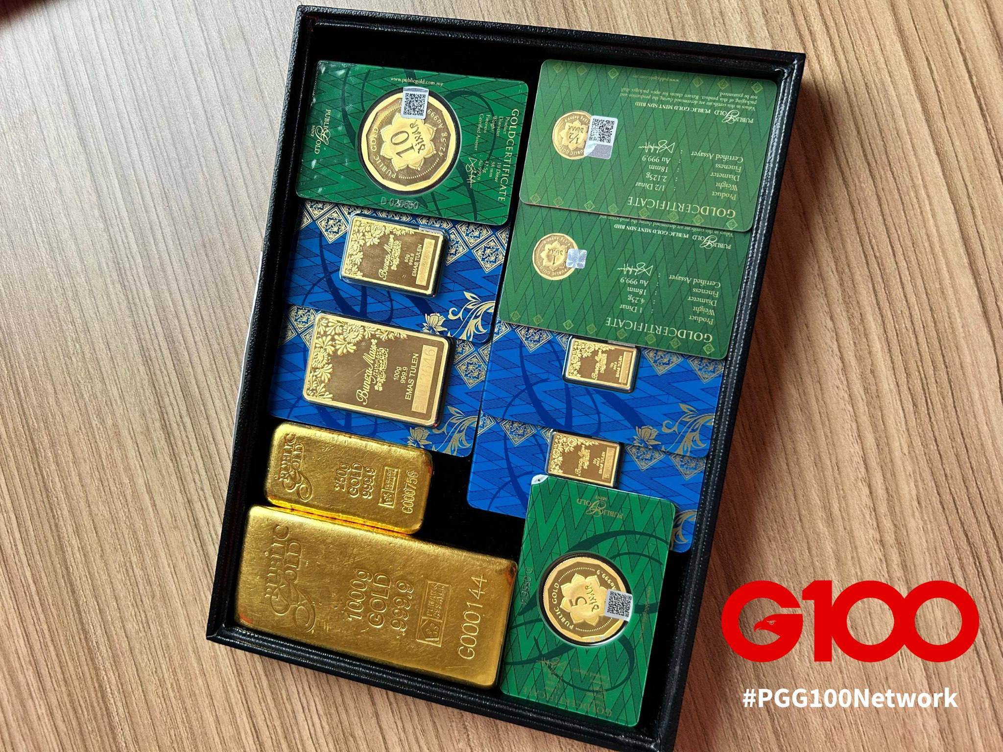 Harga emas Public Gold: koleksi jongkong dan dinar emas fisik dalam kotak